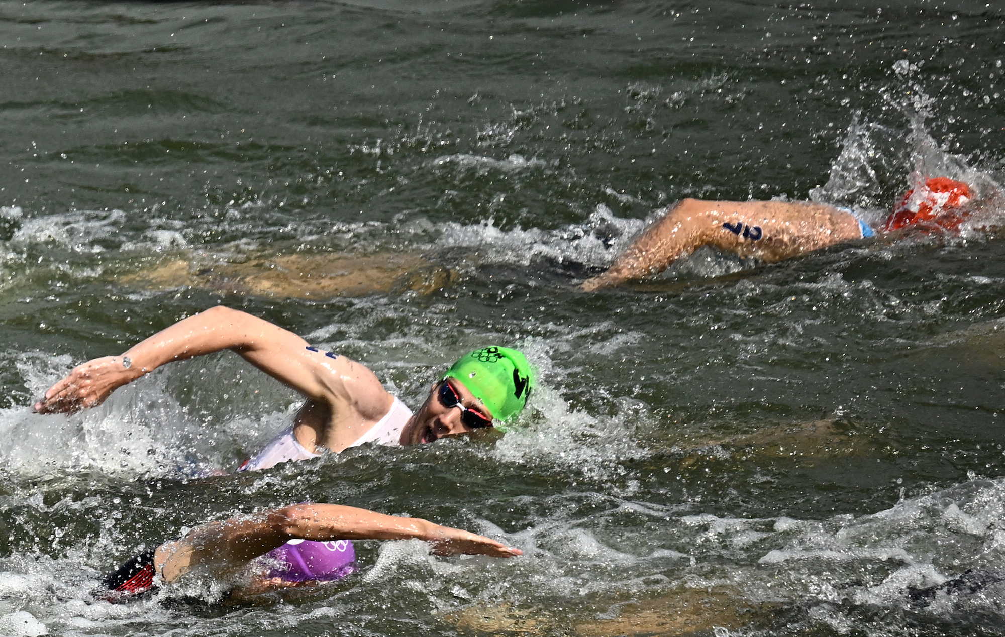 Olympic Swimmers Are Fighting Off Bacteria From the Seine by Drinking Coca-Cola