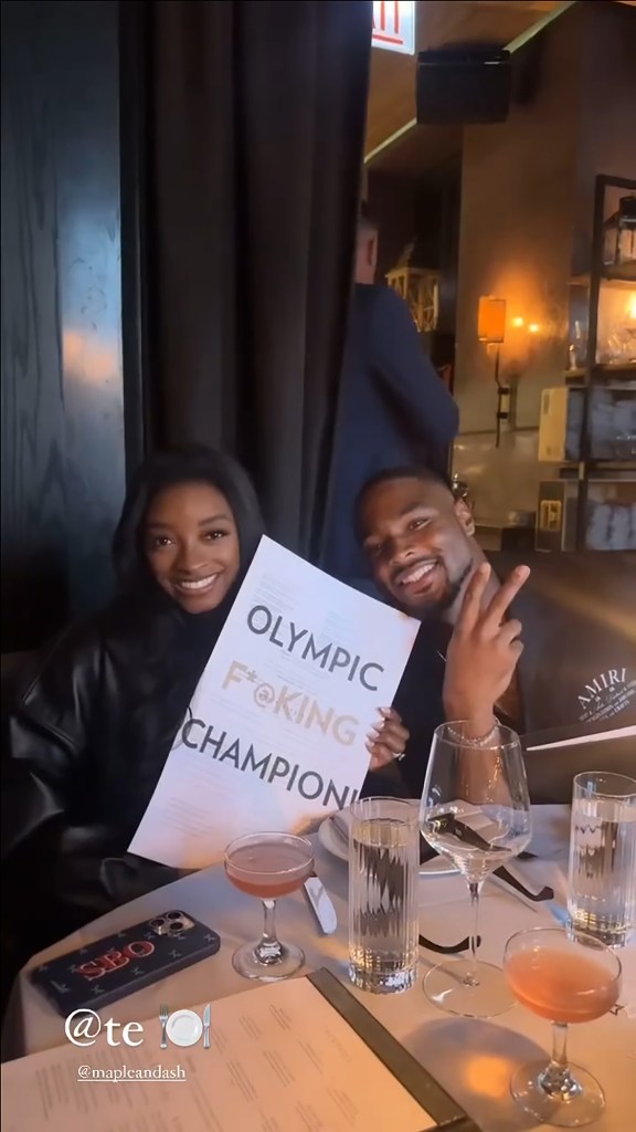 Simone Biles Poses With 'Olympic F–king Champion' Menu During Dinner With Jonathan Owens