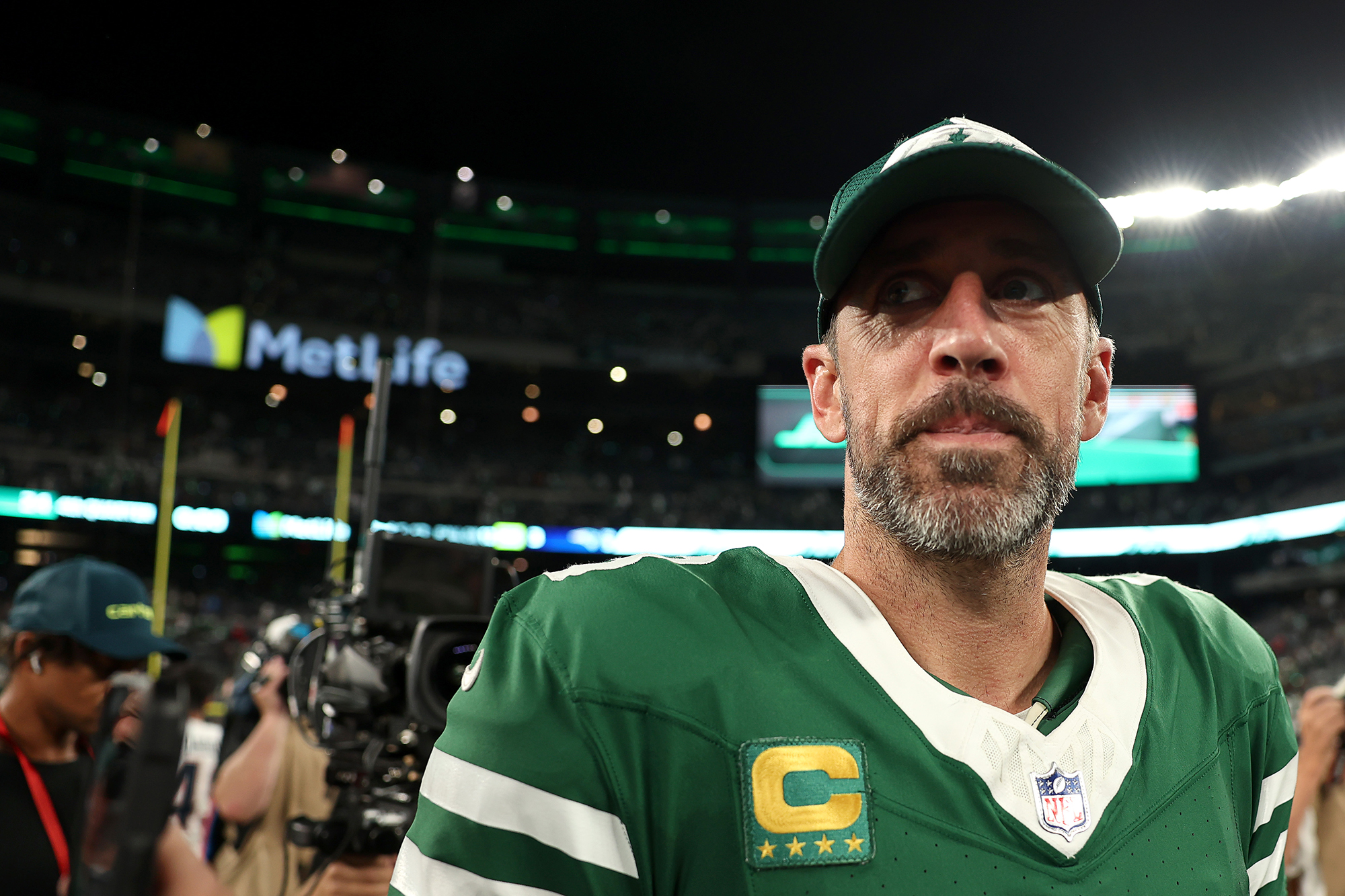 Aaron Rodgers Explains Awkward Push With Jets Coach: 'Not a Big Hugger'