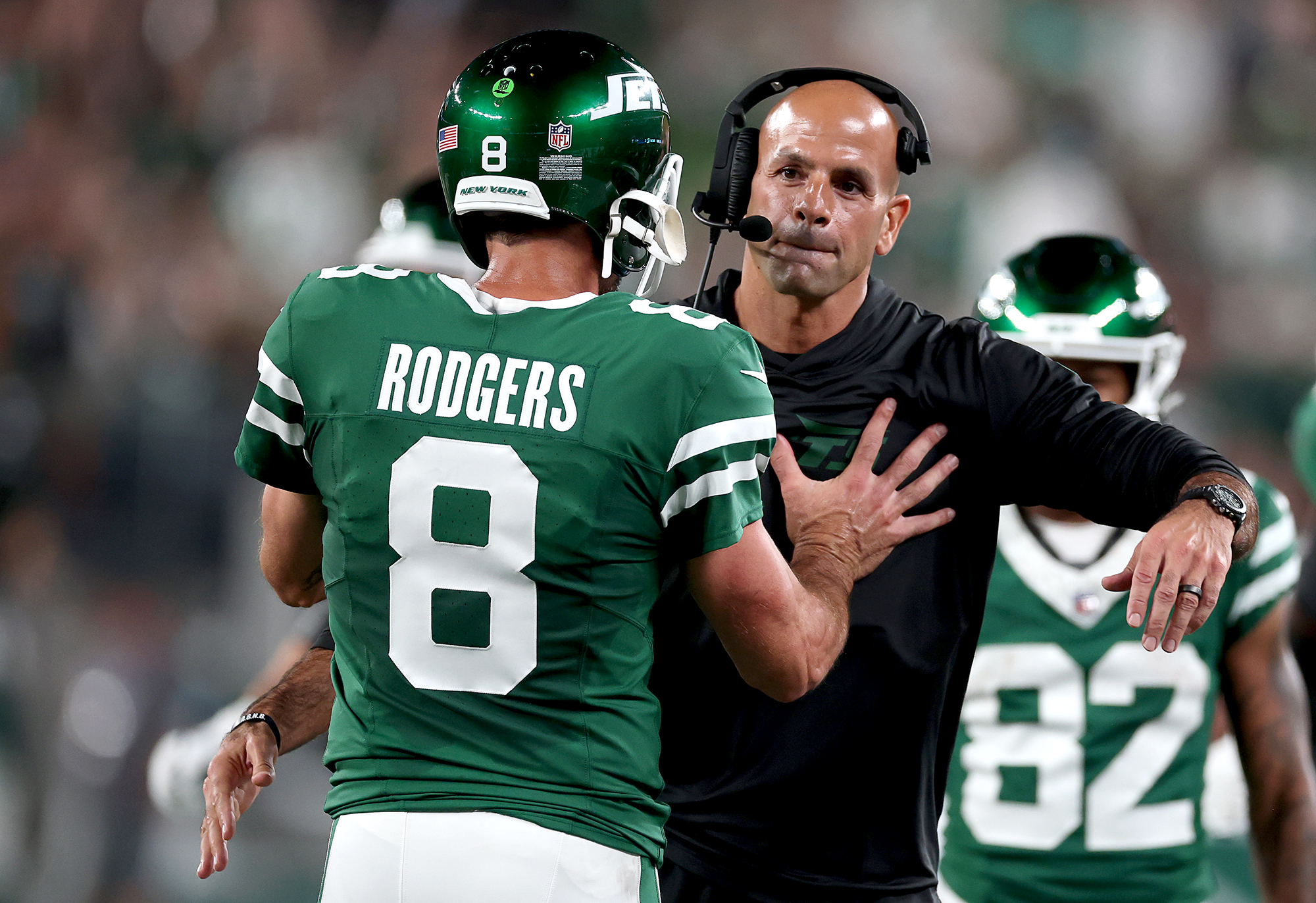 Aaron Rodgers Explains Awkward Push With Jets Coach: 'Not a Big Hugger'