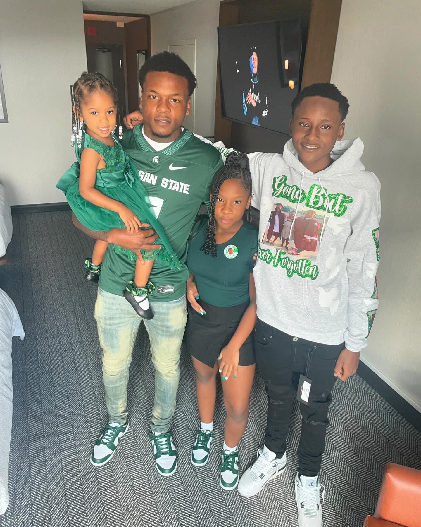 New Photo - MSU Football Player, 21, Becomes Guardian of 4 Siblings After Mom's Death