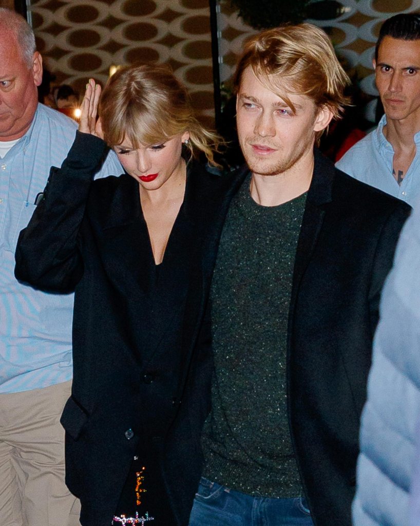 Jack Antonoff Laughs Out Loud at a William Bowery Poster Handed to Him by Fan Taylor Swift and Joe Alwyn