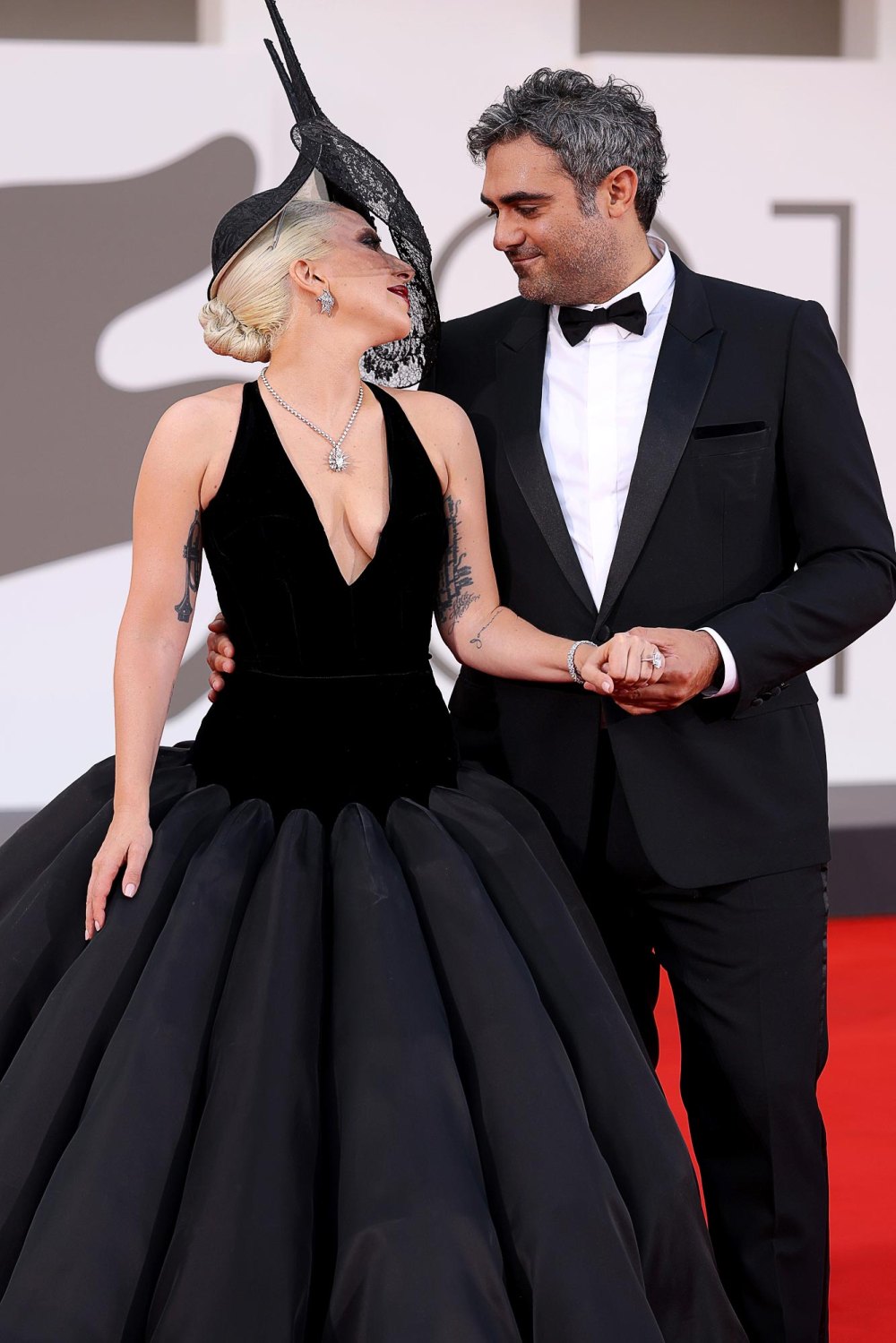 Lady Gaga and Michael Polansky attend the Joker Folie à Deux red carpet 5732