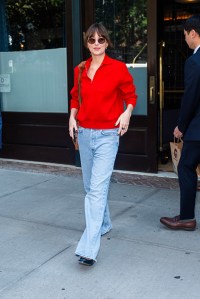 dakota johnson in new york wearing red sweater