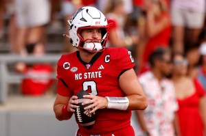 NC State QB Grayson McCall Sustains Hit to the Head, Helmet Knocked Off as He's Carted Off Field