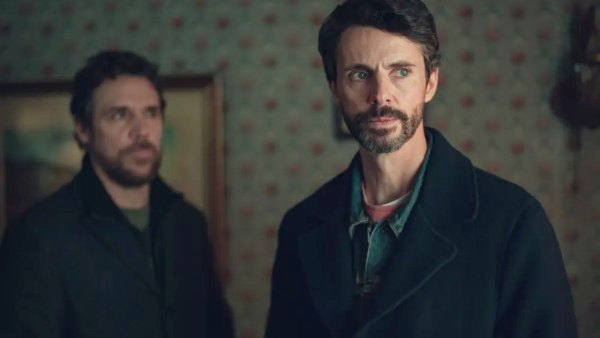 Two men stand in a room in 'Dept. Q.'