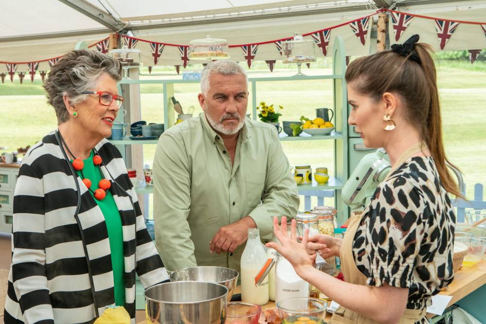 Prue Leith, judge Paul Hollywood and contestant Alice Fevronia in The Great British Baking Show