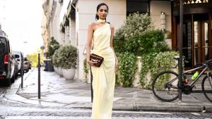 PARIS, FRANCE - SEPTEMBER 27: Malvika Sheth is seen wearing a Deme by Gabriella yellow dress and a brown and gold Tods bag outside the Nina Ricci show during Womenswear Spring/Summer 2025 as part of Paris Fashion Week on September 27, 2024 in Paris, France. (Photo by Daniel Zuchnik/Getty Images)
