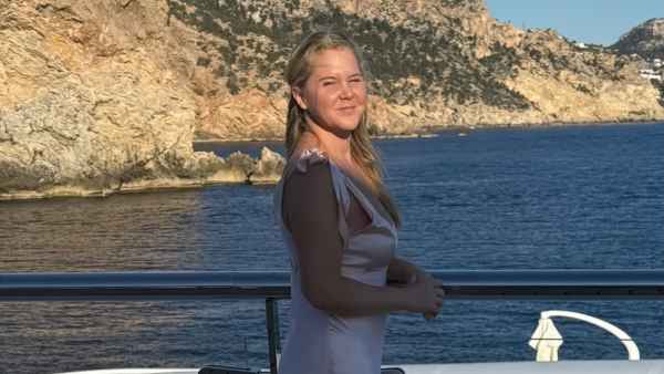 Amy Schumer Shows Off Body While Vacationing With Son Gene