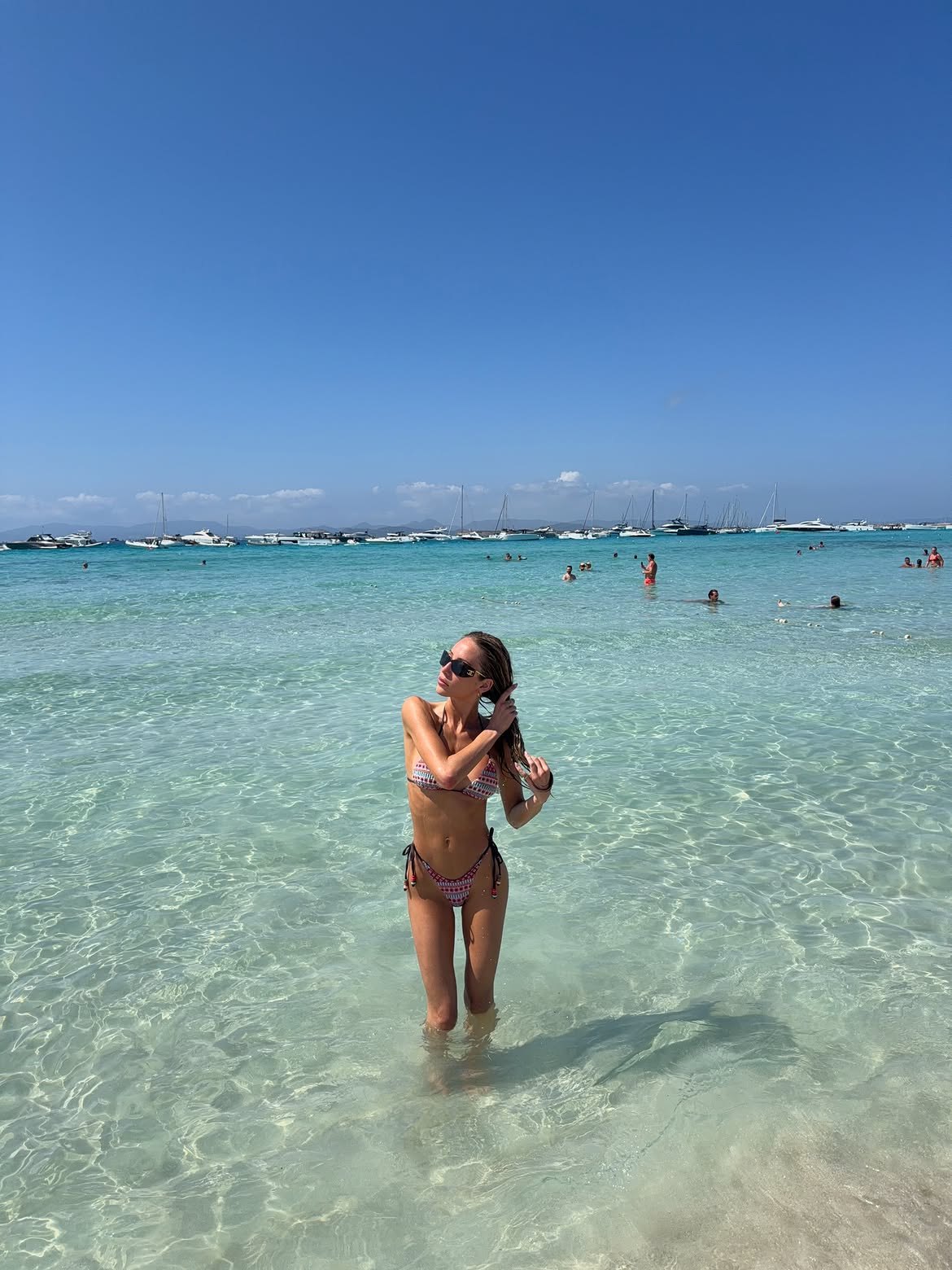 Alix Earle Stuns in Tiny Beaded Bikini With Thong Bottoms