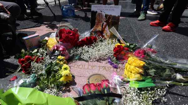GettyImages-2291504154-Dolly-Partons-Walk-of-Fame-Star-Vandalized-Flowers-Stolen.jpg