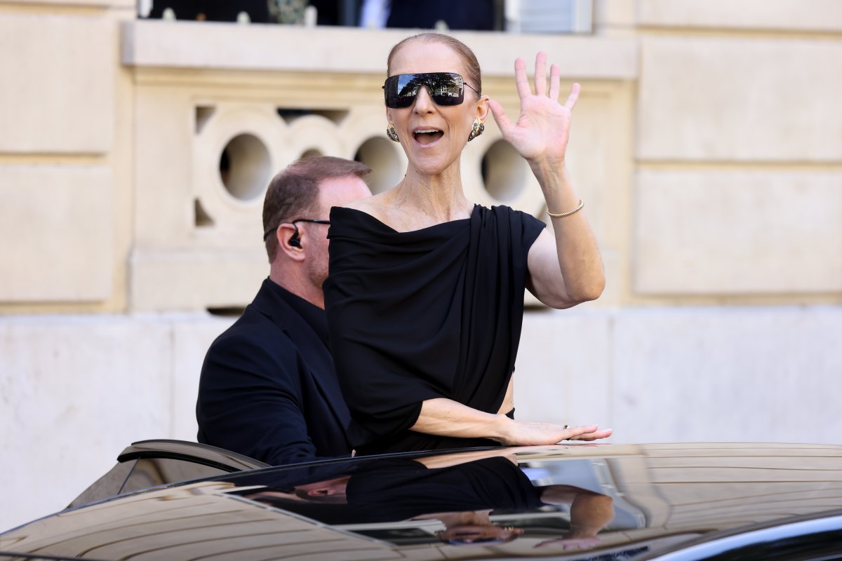 PARIS, FRANCE - SEPTEMBER 23: Celine Dion waves at her fans in front of the Royal Monceau Hotel on September 23, 2026 in Paris, France. (Photo by Marc Piasecki/GC Images)