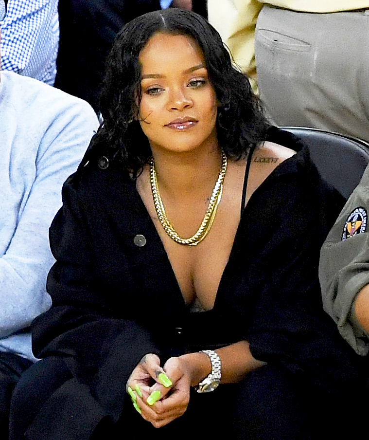Rihanna claps back at sports blogger with Gucci Mane meme
