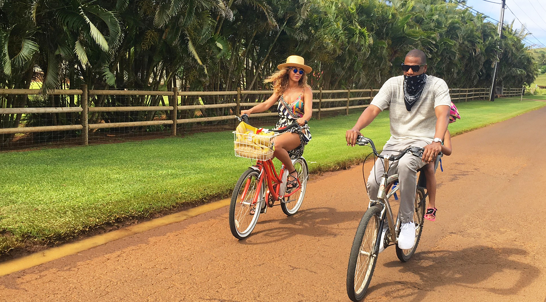 Beyonce Jay Z and Blue Ivy Take Bike Ride on Hawaiian Vacation