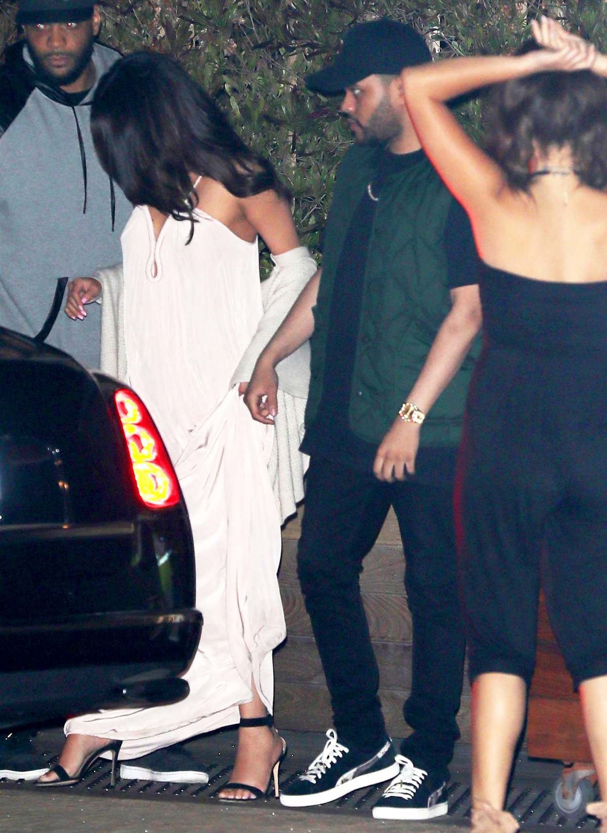 Selena Gomez and The Weeknd Dress in Matching Tracksuits at Disneyland