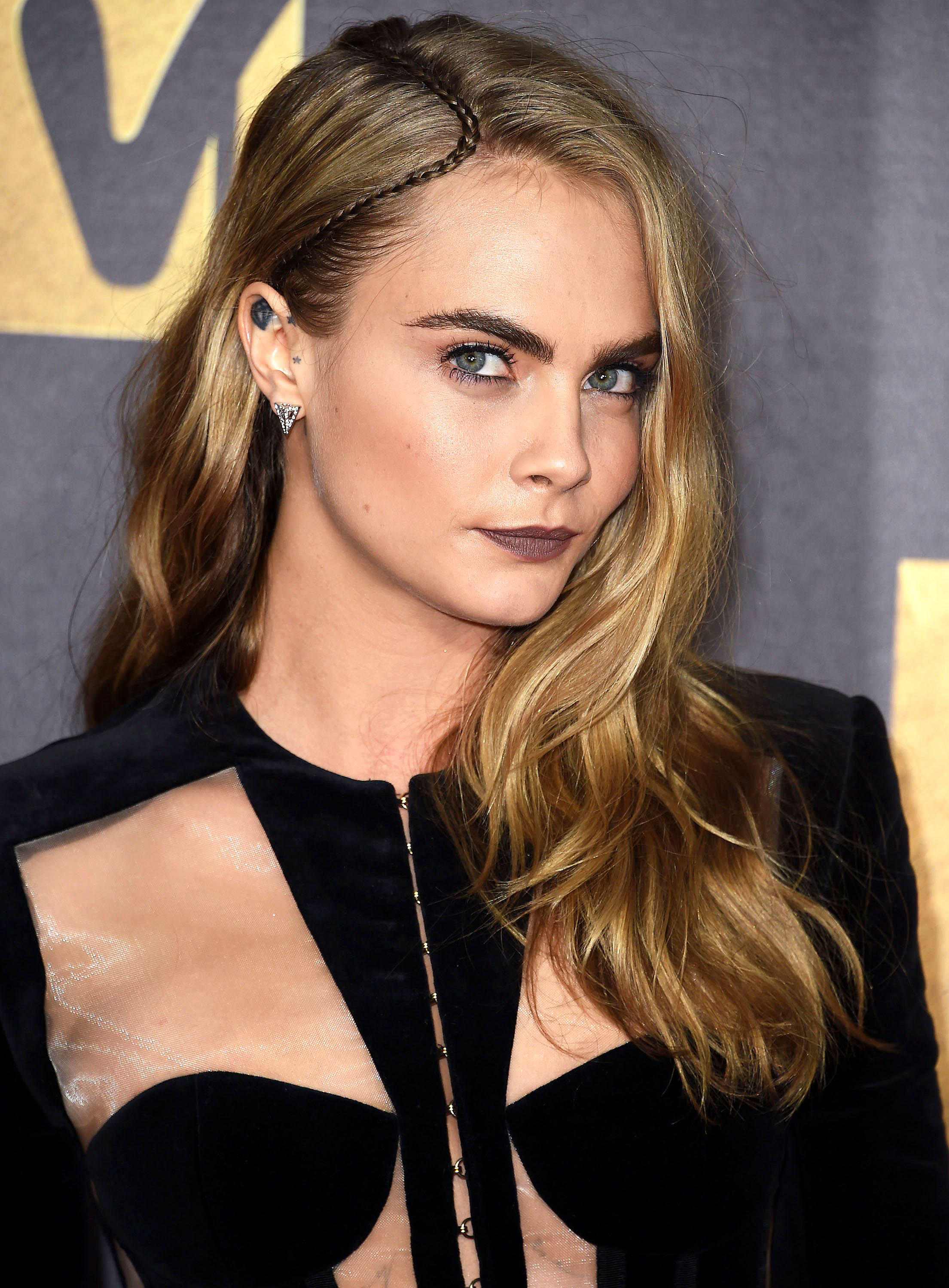 Cara Delevingne Cuts Her Blonde Hair: Before, After Photos