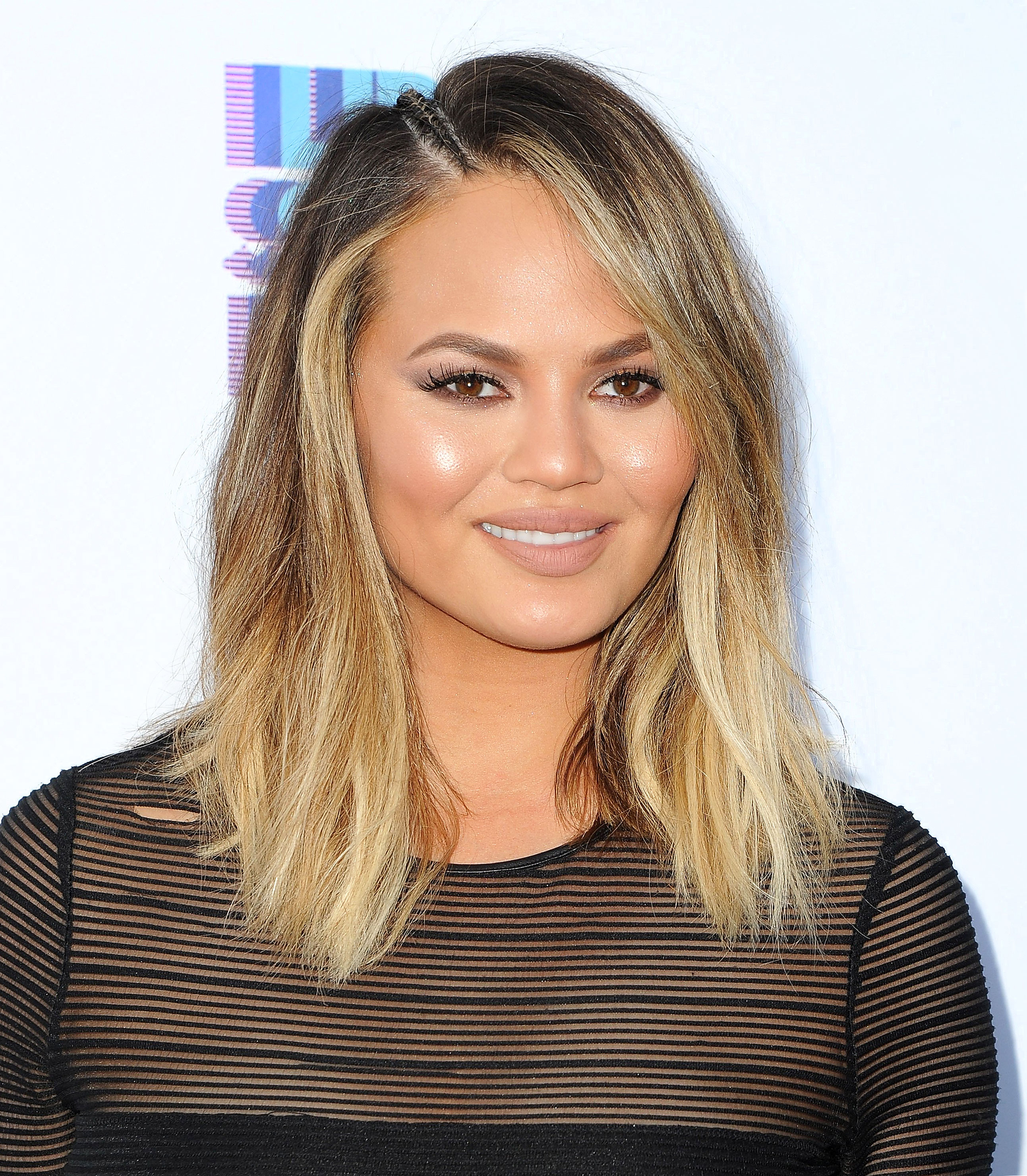 Every Genius Way Chrissy Teigen Uses Coconut Oil