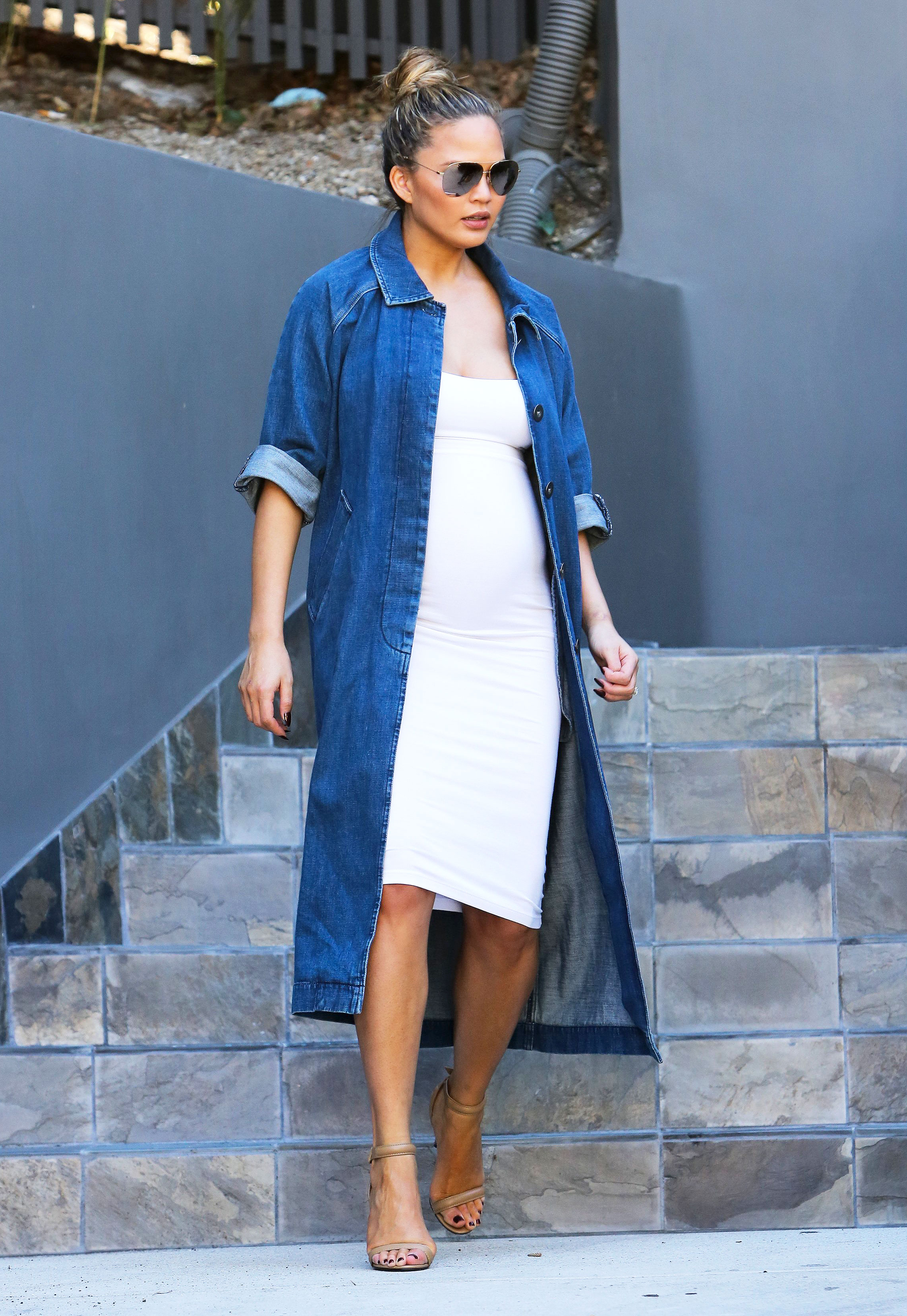 Pregnant Chrissy Teigen Pulls Off Denim Duster Coat