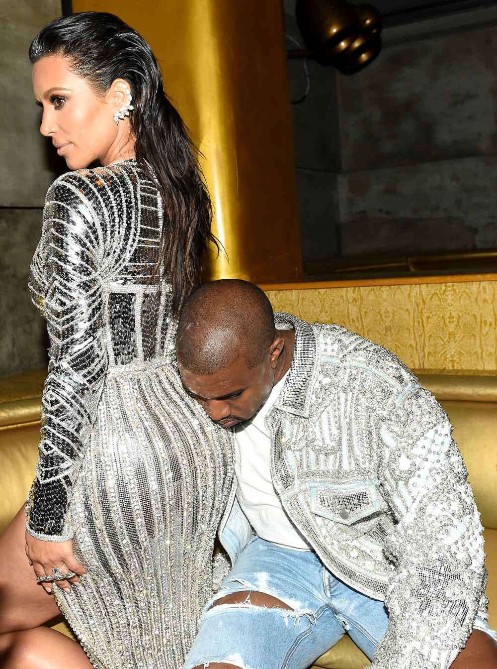Kanye West Uses Kim Kardashian's Butt as a Pillow at Balmain Party