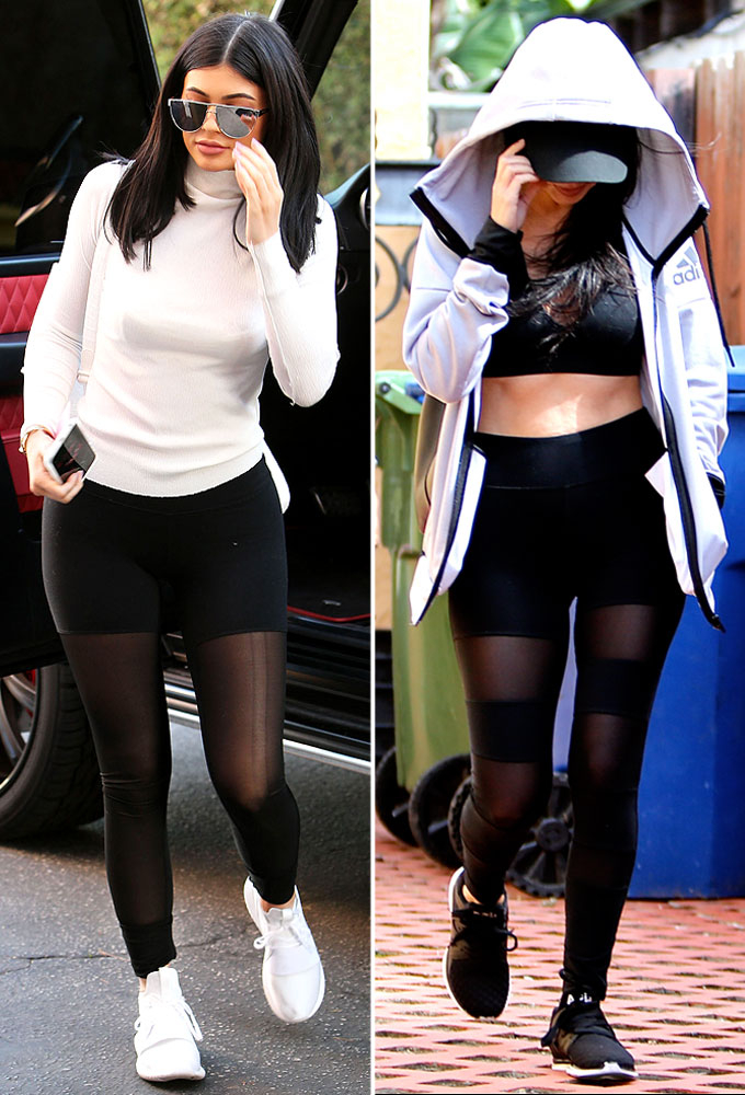 Kylie Jenner in black leggings with white piping and white