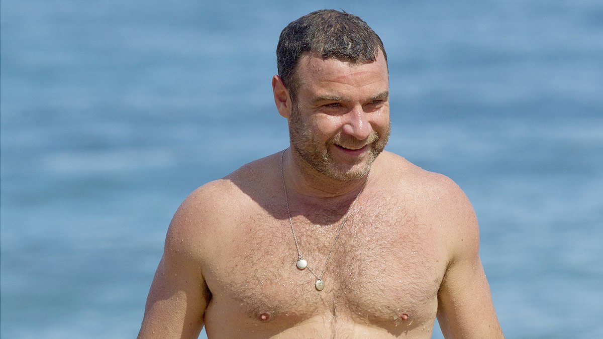 Liev Schreiber shows off his toned body on the filmset of Pawn Sacrifice  filming on Santa Monica Beach. The hunky actor was seen flexing his biceps  and running around the beach while