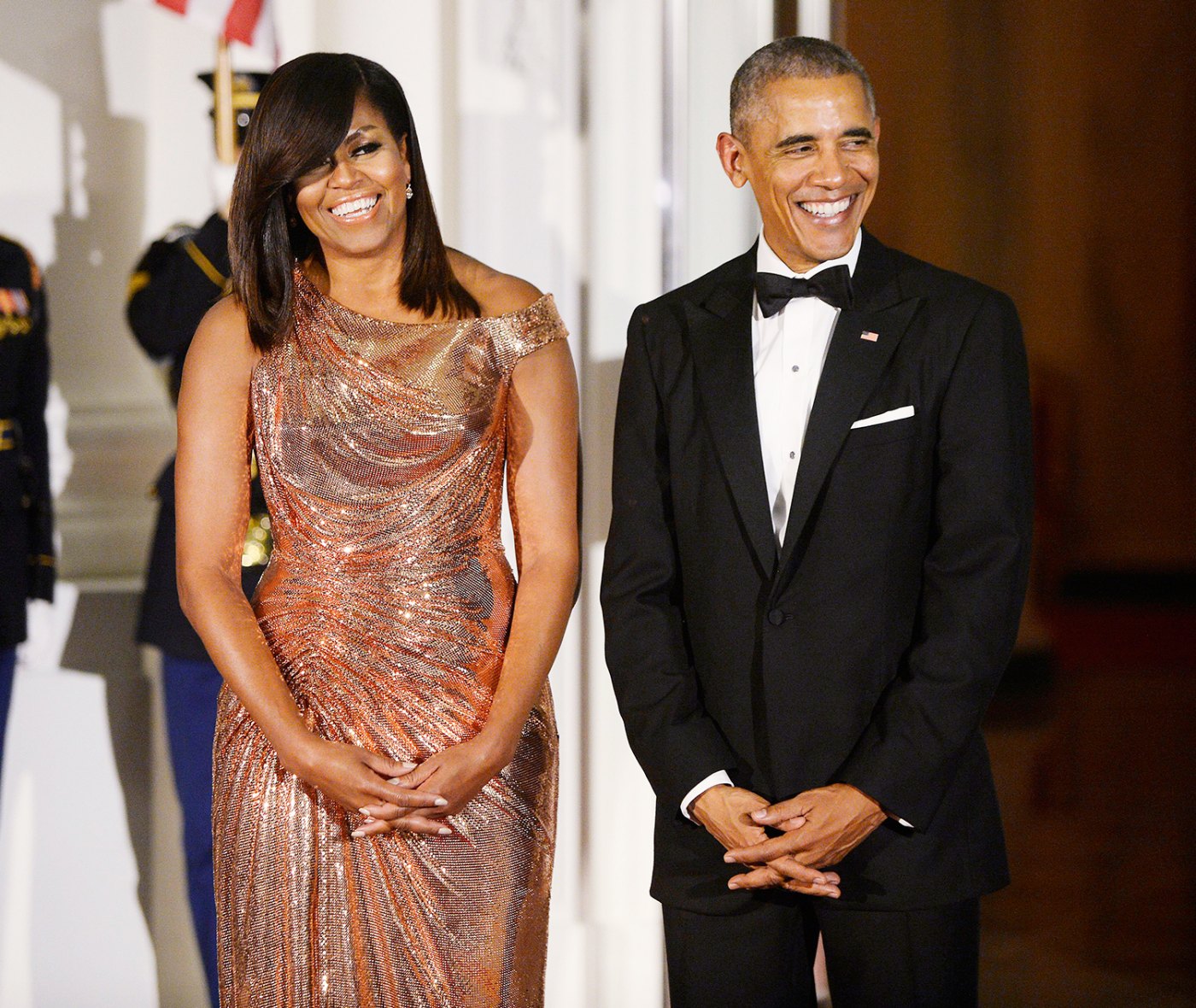 Michelle Obama Glows in Rose Gold Versace Gown | Us Weekly