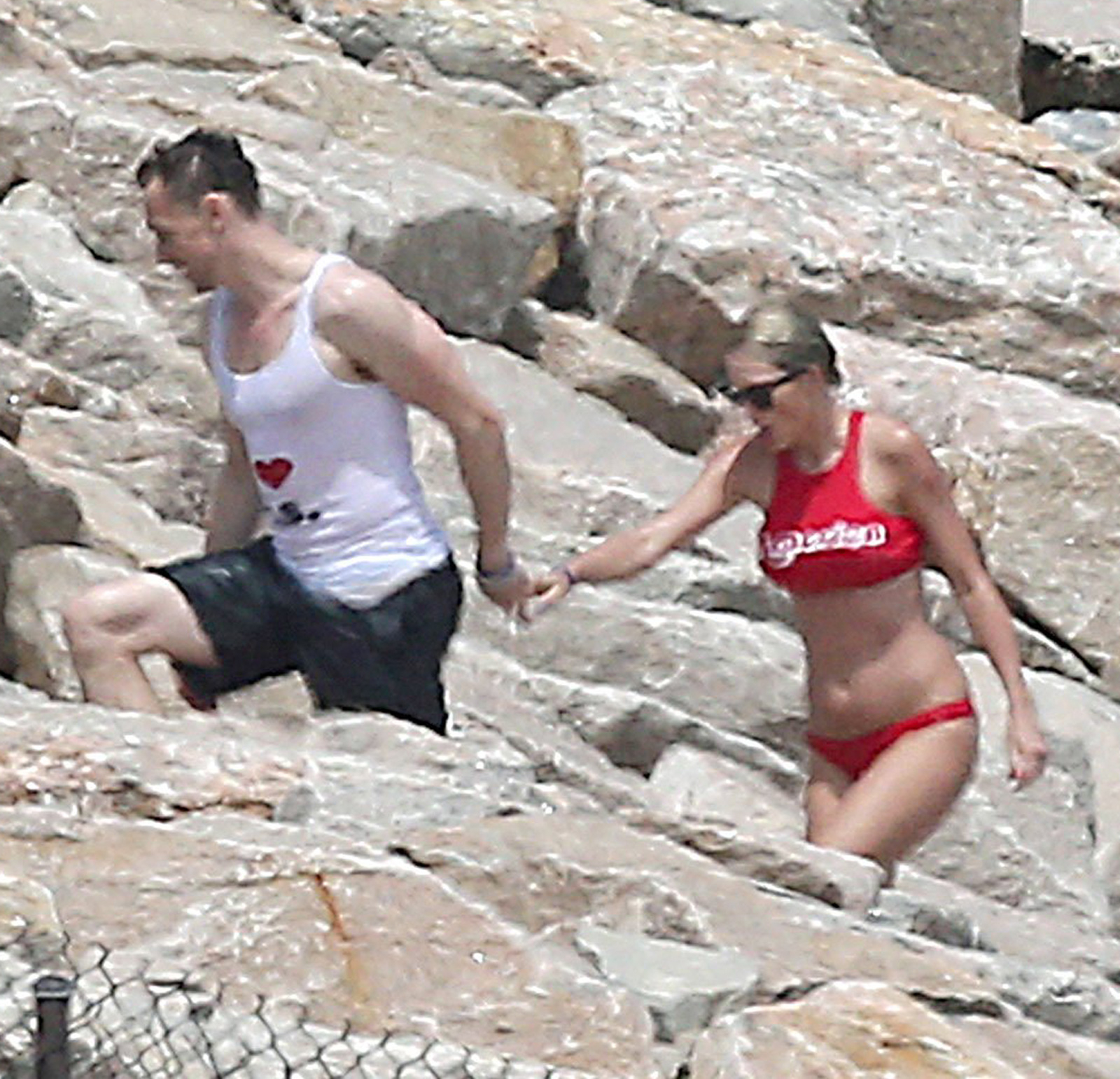 Taylor Swift Kisses Tom Hiddleston During July 4th Party 