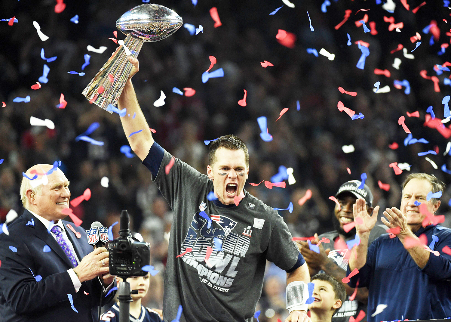 Tom Brady covers Nike logo during Super Bowl trophy presentation