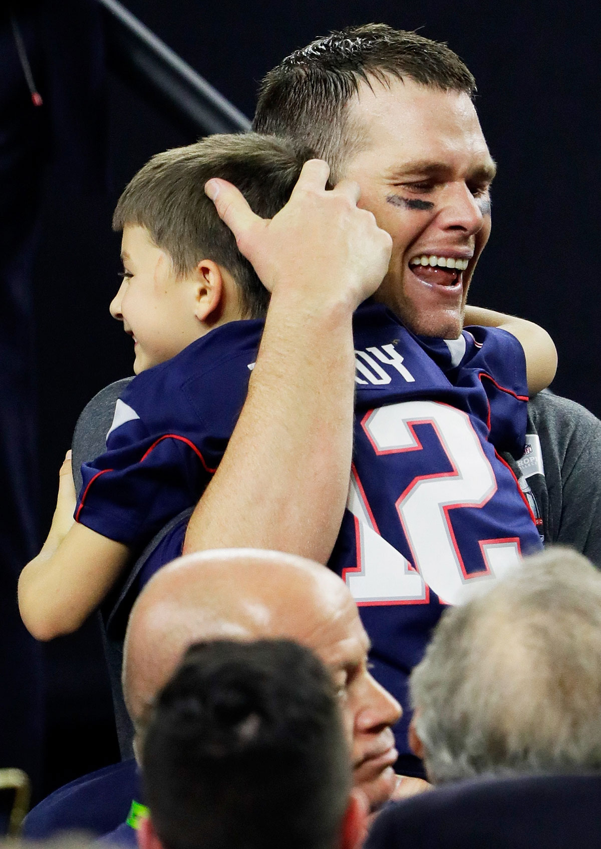 VIDEO: Tom Brady Rushes to Embrace Kids After Super Bowl Win