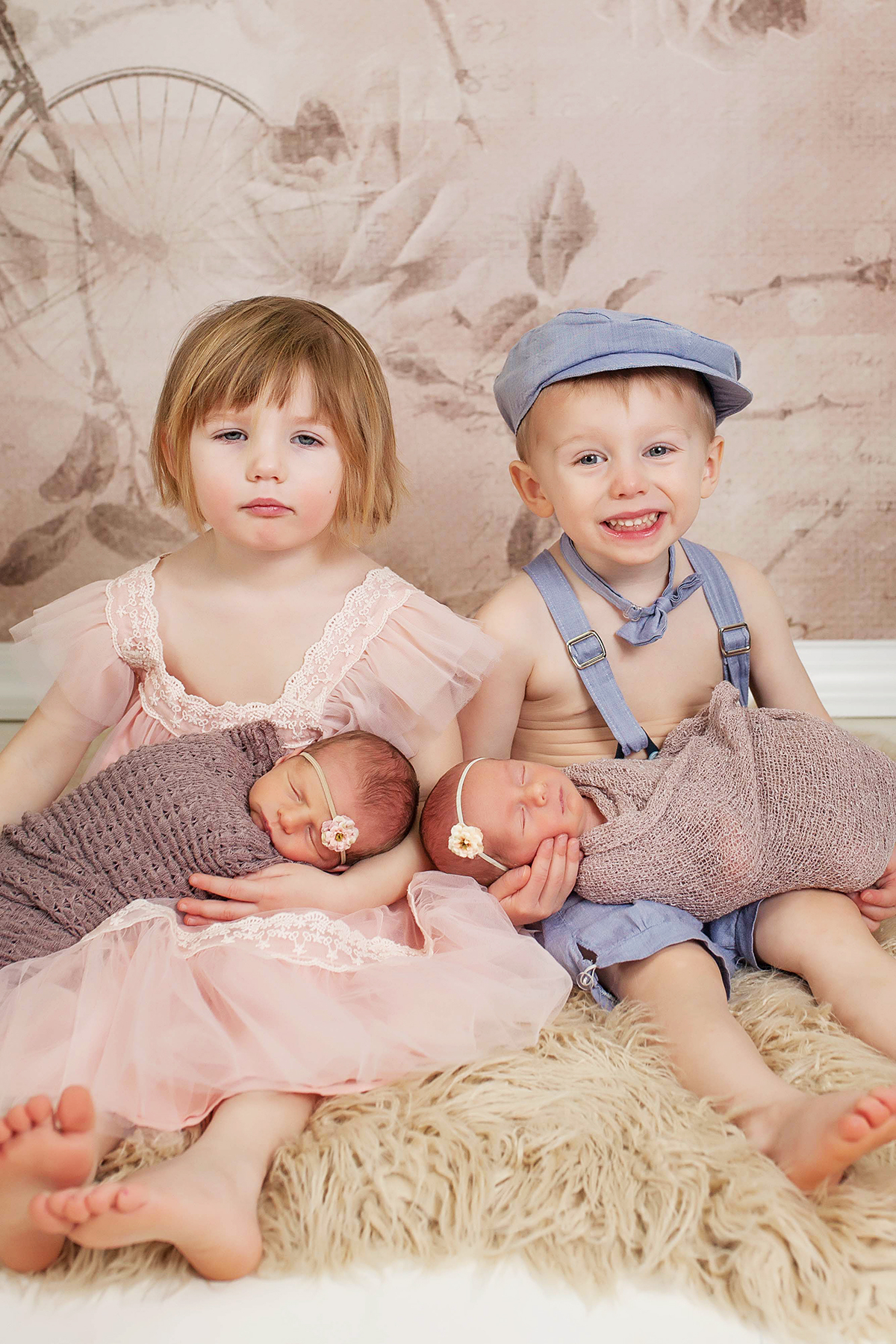 this-photo-of-toddler-twins-cuddling-newborn-twin-sisters-is-too-cute