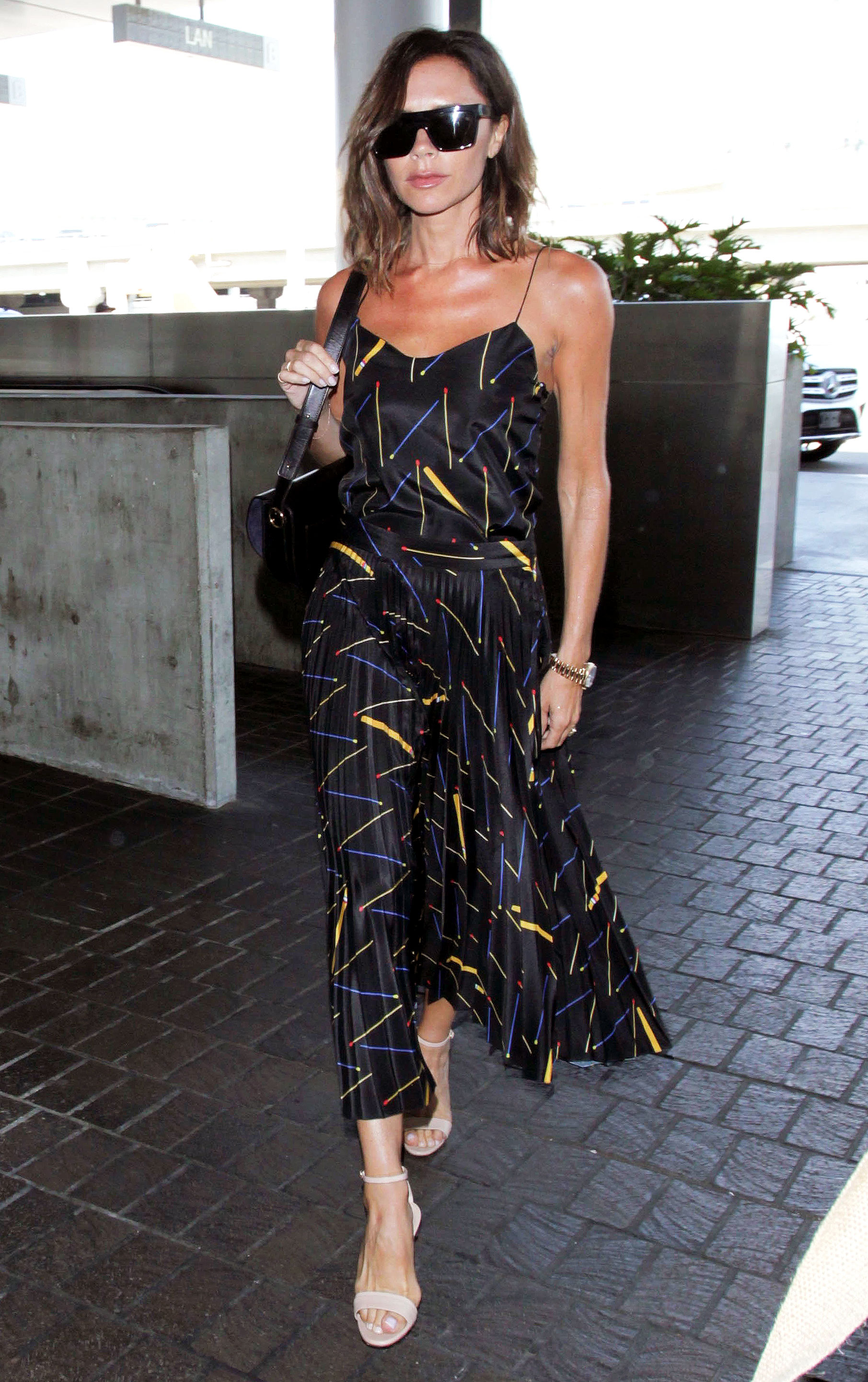 Victoria Beckham Glows in Boldly Printed Separates: Pics